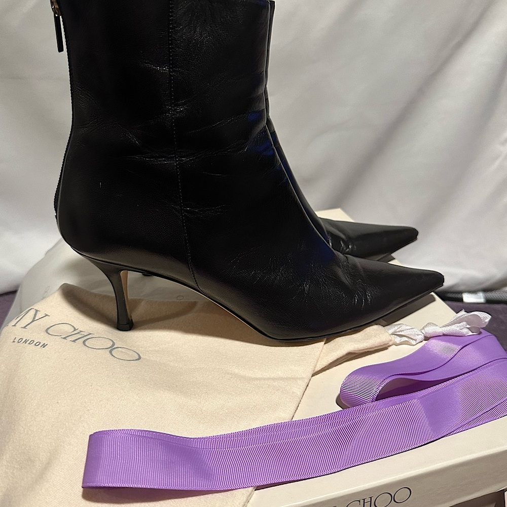 A stunning pair of Jimmy Choo ‘Kay’ booties Gently used .